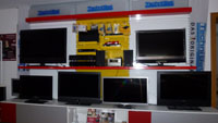 TV-Fleer Showroom mit Fernsehern und HiFi-Geräten